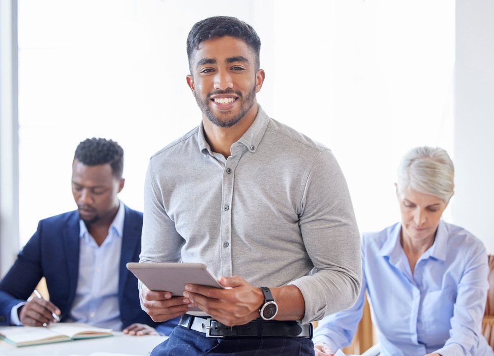 shot of a confident young businessman working in a modern office.